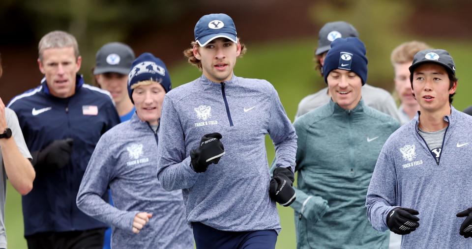 BYU’s Casey Clinger, center, works out with his cross-country teammates at BYU in Provo on Wednesday, Nov. 9, 2022.
