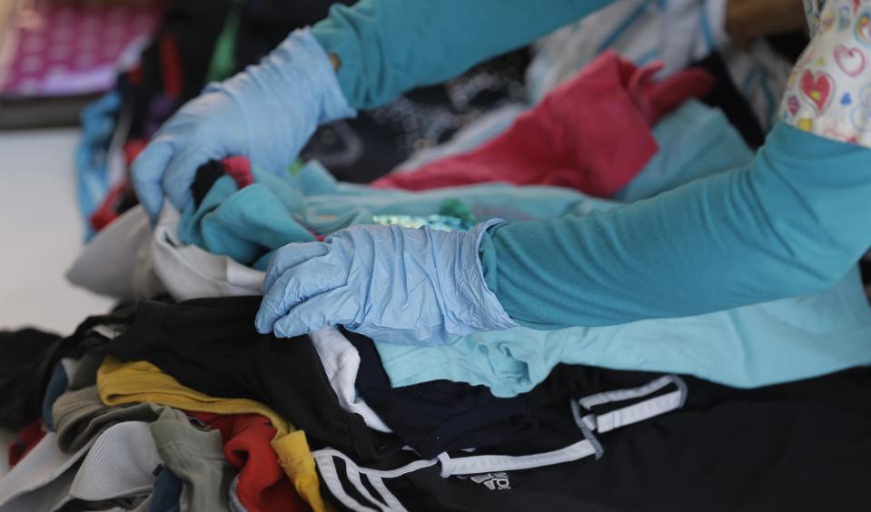 Clothes for detainees are sorted at a U.S. Customs and Border Protection processing facility in Brownsville, Texas June 18, 2014. CPB provided media tours June 18 of two locations in Brownsville and Nogales, Arizona that have been central to processing the more than 47,000 unaccompanied children who have entered the country illegally since Oct. 1. (REUTERS/Eric Gay/Pool)