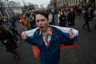 <p>Opposition supporters attend an unauthorized anti-Putin rally called by opposition leader Alexei Navalny on May 5, 2018 in Saint Petersburg, two days ahead of Vladimir Putin’s inauguration for a fourth Kremlin term. (Photo: Olga Maltseva/AFP/Getty Images) </p>