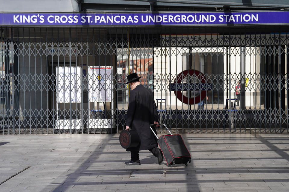 Closed gates at King's Cross St Pancras station in London on Tuesday 21 June as rail strikes take place across the UK. (PA)