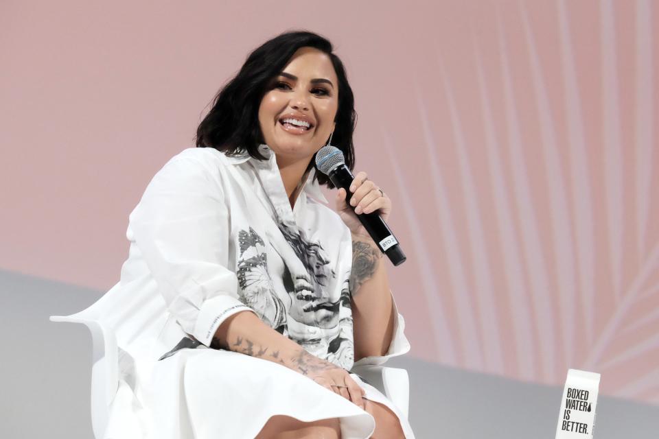 Demi Lovato opened up about her past issues with body image in an interview with Ashley Graham published Tuesday.