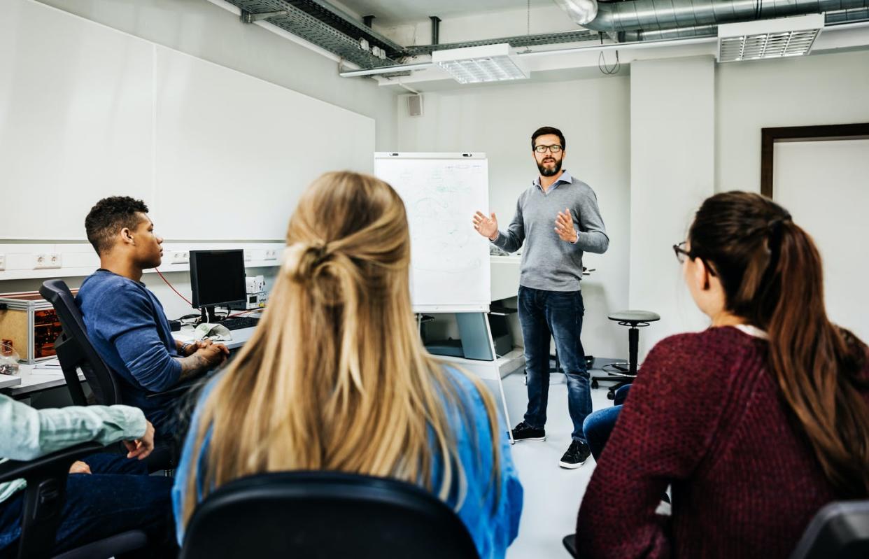 <span class="caption">Classroom experiments show how the coronavirus can spread and who's at greatest risk. </span> <span class="attribution"><a class="link " href="https://www.gettyimages.com/detail/photo/engineering-tutor-explaining-concept-during-royalty-free-image/872025858" rel="nofollow noopener" target="_blank" data-ylk="slk:Tom Werner via Getty Images;elm:context_link;itc:0;sec:content-canvas">Tom Werner via Getty Images</a></span>