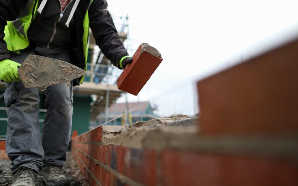 Young workers in low-paid jobs, such as construction, will pay into pension schemes for the first time - Bloomberg