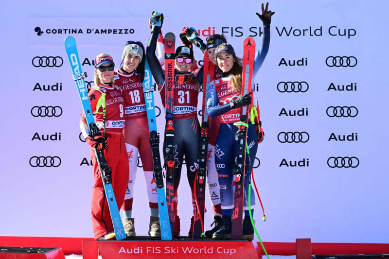 Austria's Stephanie Venier, Switzerland's Lara Gut-Behrami, Canada's Valerie Grenier, Austria's Christina Ager, Italy's Sofia Goggia, celebrate on the podium of the Women's Downhill event of FIS Alpine Skiing World Cup in Cortina d'Ampezzo, Italy. Tiziana Fabi/AFP/dpa