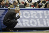 FILE - In this March 19, 2006, file photo, North Carolina head coach Roy Williams looks down near the end of the NCAA second-round men's basketball game against George Mason in Dayton, Ohio. George Mason beat North Carolina, 65-60. (AP Photo/Ed Reinke, File)