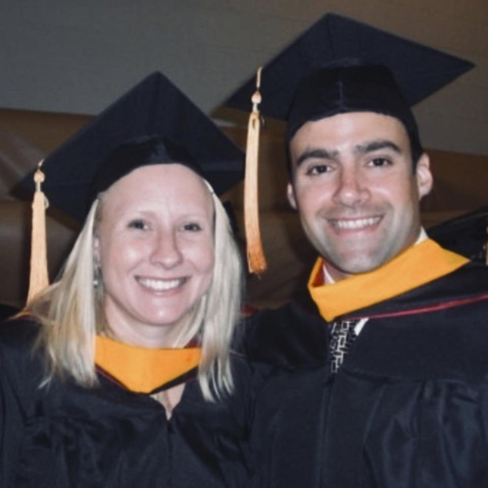 This 2009 photo provided by Ben Cayer shows him and Mindy Brock during their Certified Registered Nurse Anesthetist school graduation in Jackson, Tenn. They met in nurse anesthesia school in 2007. In classes, they sat in alphabetical order - Brock next to Cayer, she says, “and it just took off from there.” (Courtesy Ben Cayer via AP)