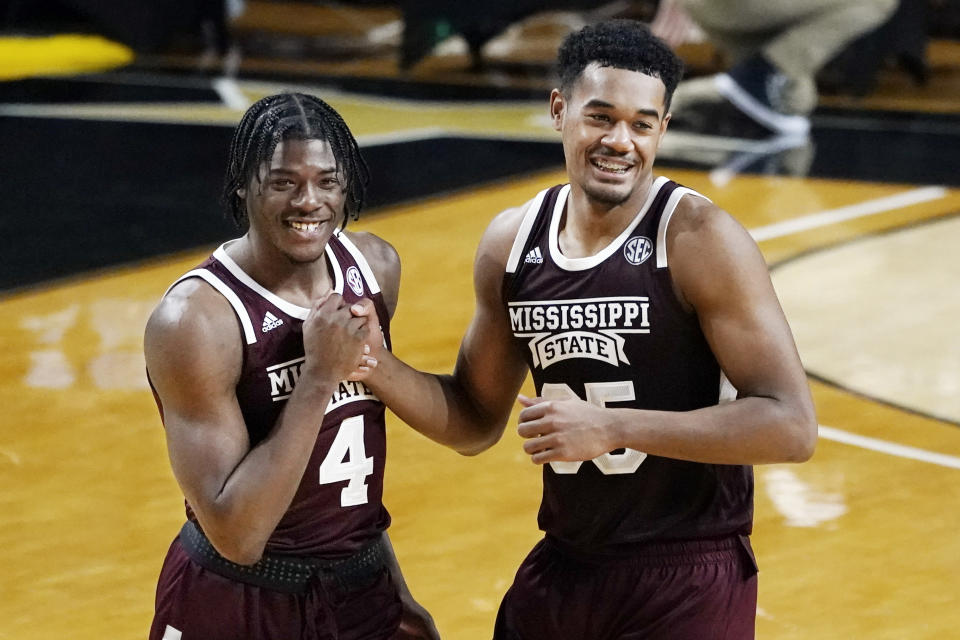 Mississippi State guard Cameron Matthews (4) and forward Tolu Smith (35) celebrate after a win over Vanderbilt in an NCAA college basketball game Saturday, Jan. 9, 2021, in Nashville, Tenn. (AP Photo/Mark Humphrey)