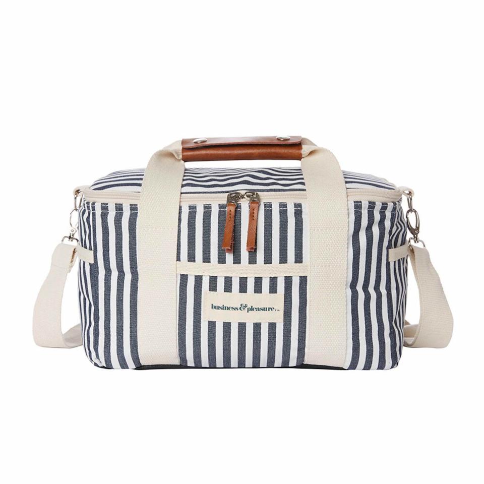 <p>Keep your beverages at the perfect temperature whatever the weather in this nautical-look striped cooler bag. It has a canvas exterior with leather detailing and is available in a choice of seven colours. £75, <a href="https://go.redirectingat.com?id=127X1599956&url=https%3A%2F%2Fwww.amara.com%2Fproducts%2Fpremium-cooler-bag-laurens-navy-stripe&sref=https%3A%2F%2Felledecoration.co.uk%2Fdesign%2Fg36766200%2Fbest-picnic-sets%2F" rel="nofollow noopener" target="_blank" data-ylk="slk:amara.com;elm:context_link;itc:0;sec:content-canvas" class="link ">amara.com</a></p>