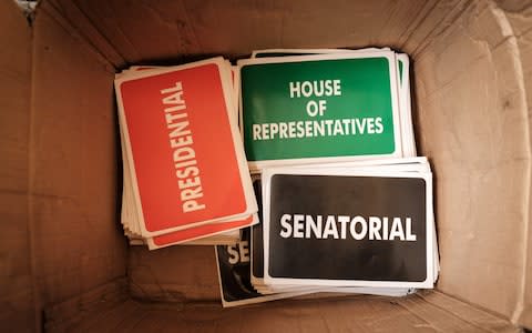 Stickers for ballot boxes are seen during the electoral preparation at a local office of the Independent National Electoral Commission (INEC) in Port Harcourt - Credit: AFP