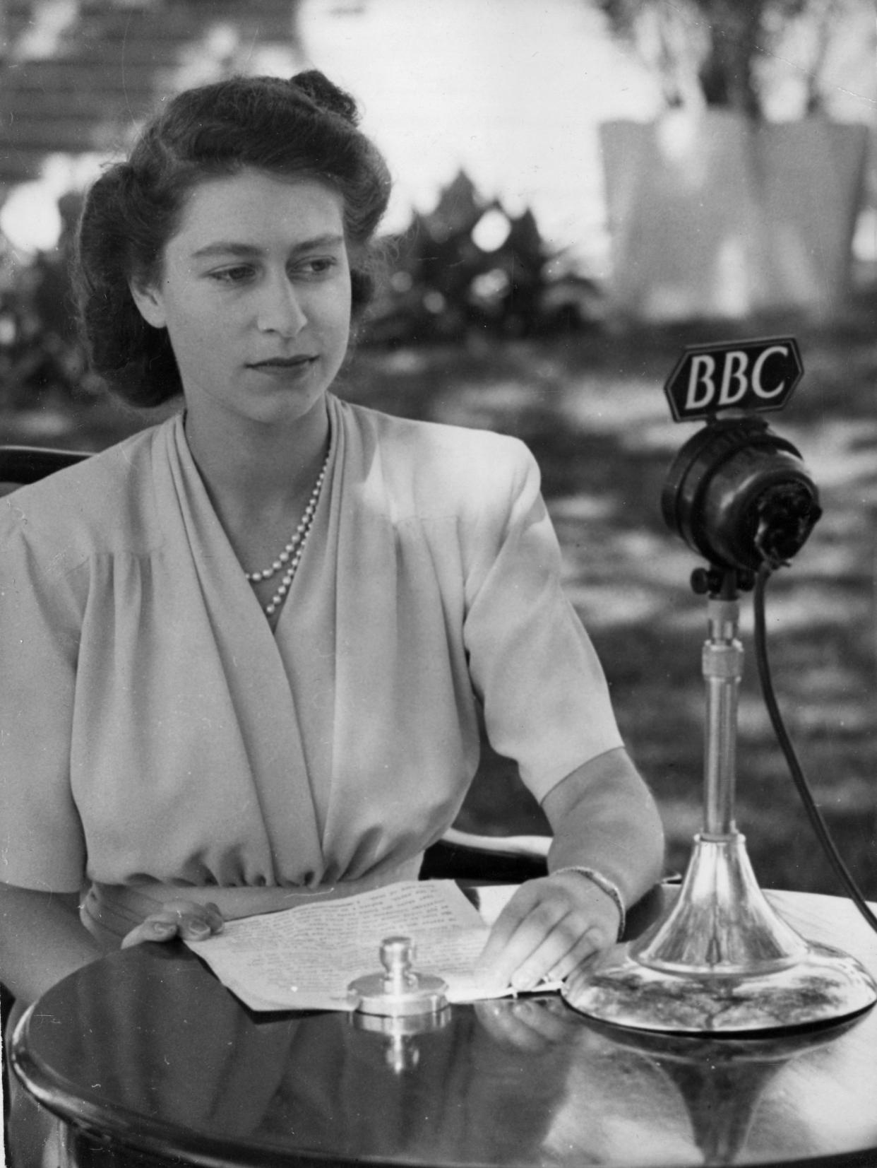 H.R.H. British Princess Elizabeth before a microphone for her birthday speech which she made was taken in Cape Town, South Africa, April 19, 1947 for her 21st birthday, April 21.
