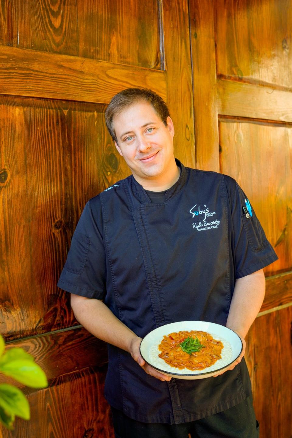 Chef Kyle of Table 301/Soby's showcasing their shrimp & grits dish which was voted best in Greenville in our March Madness foodie poll