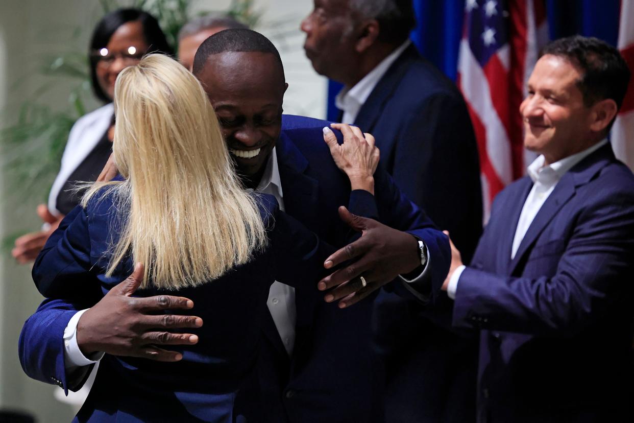 Market President, North Florida at Florida Blue, Darnell Smith hugs Mayor-elect Jacksonville Donna Deegan at a press conference Thursday, May 25, 2023 at City Hall in Jacksonville, Fla. This was Deegan’s first press conference as mayor-elect. 