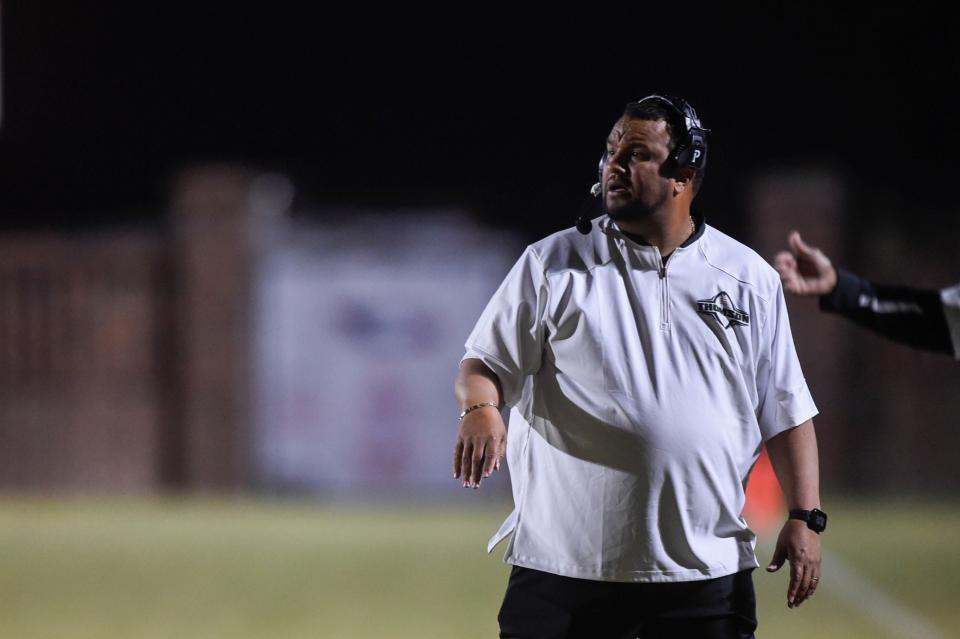 Thomson Head Coach Michael Youngblood watches from the sidelines during the Thomson and Putnam County football game at the Brickyard in Thomson, Ga., on Friday, Oct. 21, 2022. Thomson defeated Putnam County 27-3. 