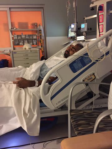 <p>Courtesy of Chinna Balachandran and Erica Wendel</p> Chinna Balachandran in the hospital after his surgery