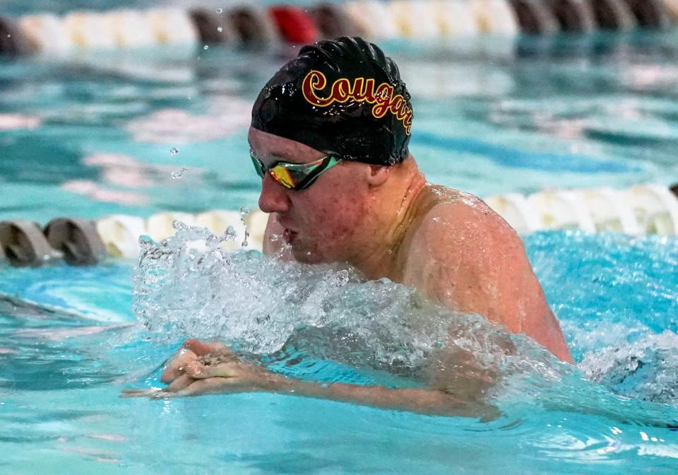 Bloomington North’s Jeremiah Boshears competes in the 100 breaststroke during the 2021 Conference Indiana meet at Bloomington South. Boshears, a freshman, won the title in 1:00.68.