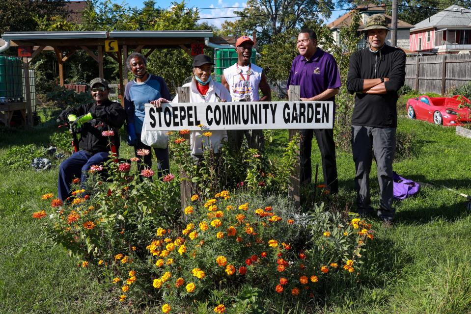 Members of the Stoepel Cutis-7 Mile Block Club partner with ARISE Detroit! to help maintain their community garden in Detroit on Oct. 20, 2021. ARISE Detroit! partners with more than 400 community organizations across Detroit like the Stoepel Curtis-7 Mile Block Club. The garden was started after four homes burned down when a transformer caught fire, setting the homes ablaze. The community wanted people to stop using the lot for dumping grounds and started a community garden.