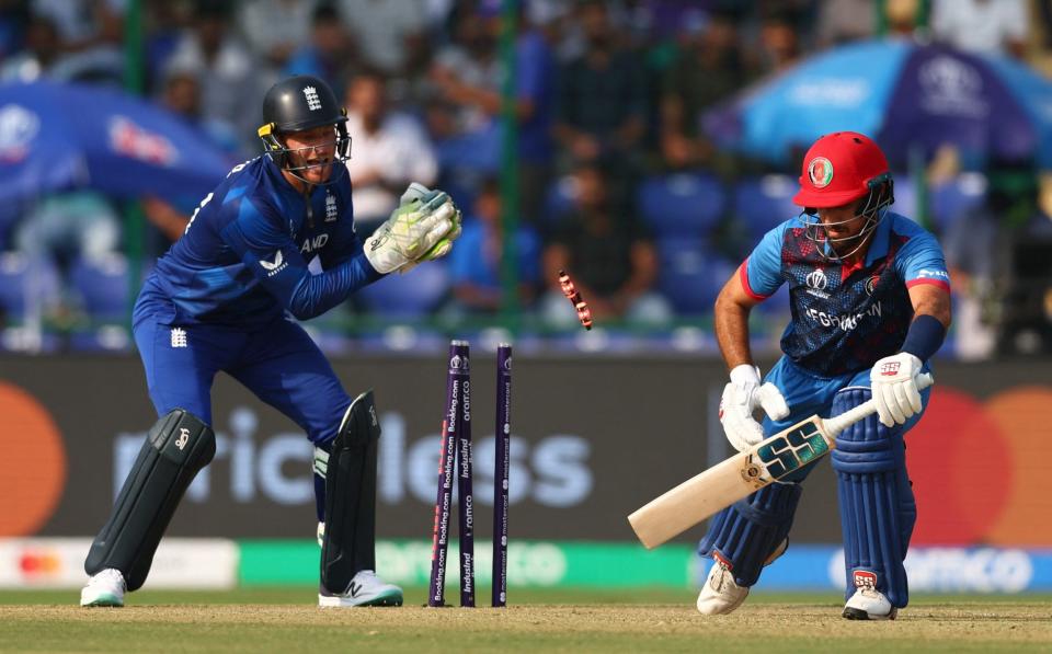 Afghanistan's Rahmat Shah is stumped out by England's Jos Buttler off the bowling of Adil Rashid