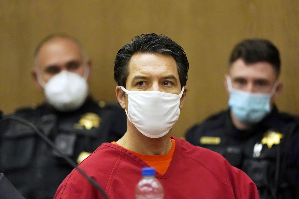 Scott Peterson listens during a hearing at the San Mateo County Superior Court in Redwood City, Calif., in February 2022.  (Jeff Chiu / AP file)