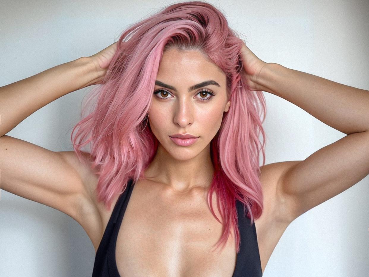 Ai-generated image of a woman with pink haire wearing a black tank top.