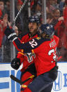 SUNRISE, FL - APRIL 15: Stephen Weiss #9 is congratulated by Kris Versteeg #32 of the Florida Panthers after he scored a first period goal against the New Jersey Devils in Game Two of the Eastern Conference Quarterfinals during the 2012 NHL Stanley Cup Playoffs at the BankAtlantic Center on April 15, 2012 in Sunrise, Florida. (Photo by Joel Auerbach/Getty Images)