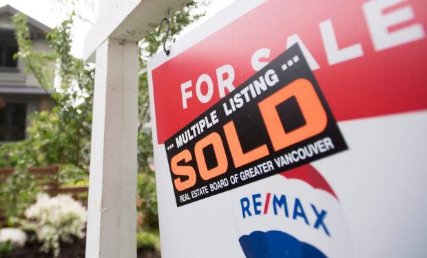 Some investors are pooling their money to buy a share of properties through crowdfunding. (Jonathan Hayward/The Canadian Press - image credit)