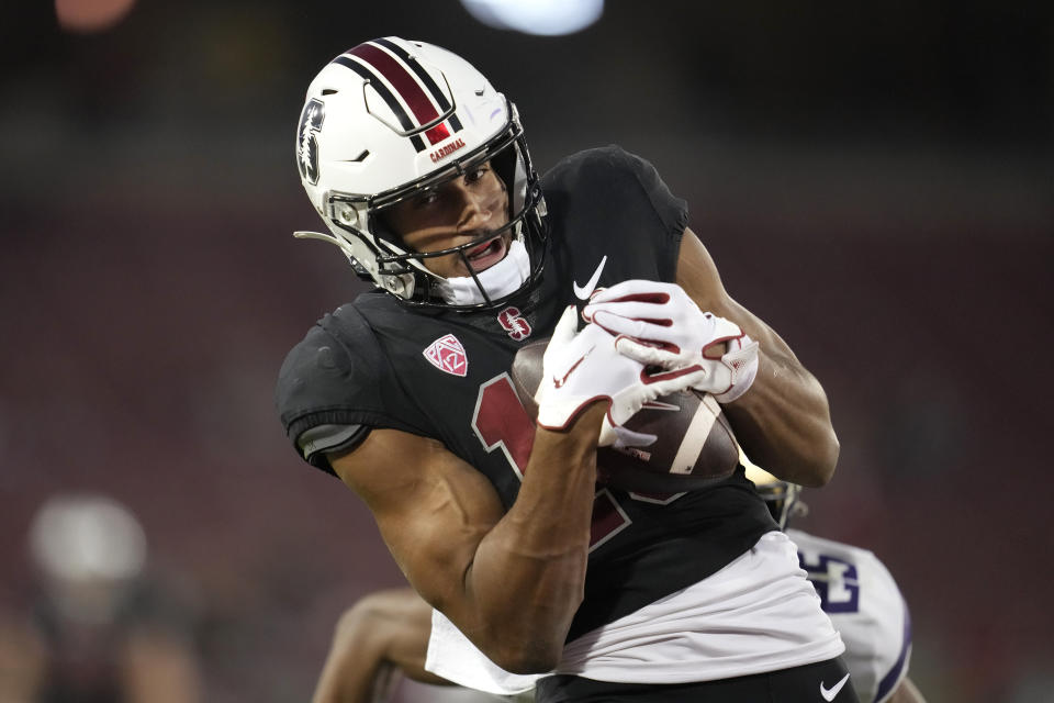 Stanford wide receiver Elic Ayomanor catches a touchdown pass against Washington during the second half of an NCAA college football game in Stanford, Calif., Saturday, Oct. 28, 2023. (AP Photo/Jeff Chiu)