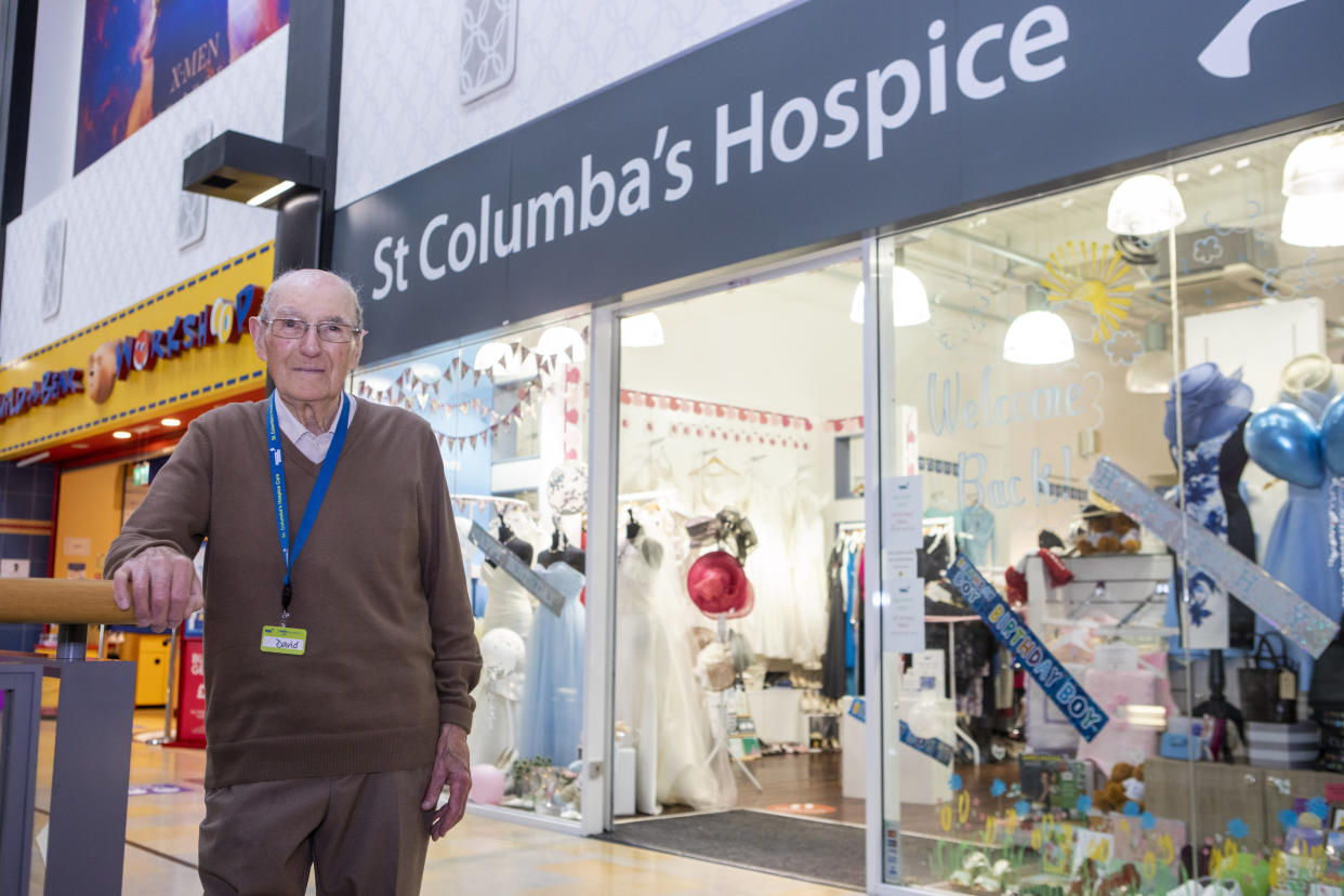 Ninety-nine-year-old David Flucker is still working a four day a week at St Columba's Hospice Charity Shop in Edinburgh. (SWNS)