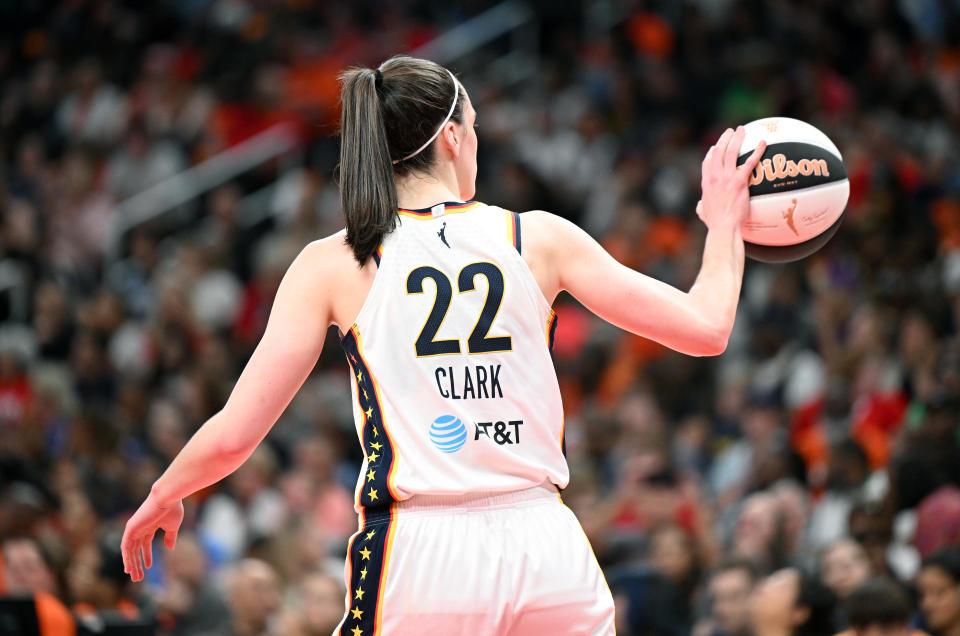 WASHINGTON, DC - JUNE 07: Caitlin Clark #22 of the Indiana Fever holds the ball against the Washington Mystics at Capital One Arena on June 07, 2024 in Washington, DC.  NOTE TO USER: User expressly acknowledges and agrees that by downloading and/or using this photograph, User is agreeing to the terms and conditions of the Getty Images License Agreement.  (Photo by G Fiume/Getty Images)