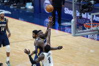 New Orleans Pelicans forward Zion Williamson shoots over Brooklyn Nets forward Jeff Green (8) in the second half of an NBA basketball game in New Orleans, Tuesday, April 20, 2021. (AP Photo/Gerald Herbert)