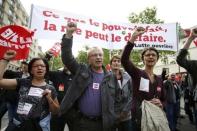 French labour union members march during a demonstration in protest of the government's proposed labour law reforms in Paris, France, May 26, 2016. REUTERS/Charles Platiau