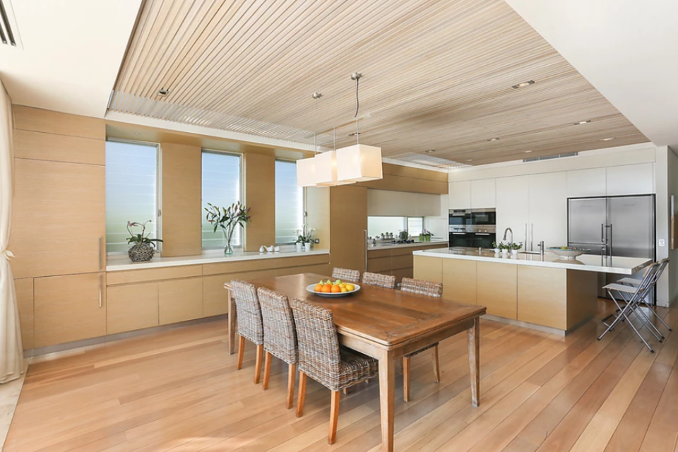 <p>The kitchen features gas and induction cooktops, a steam oven and high quality appliances. <br>Photo: Ray White Double Bay </p>