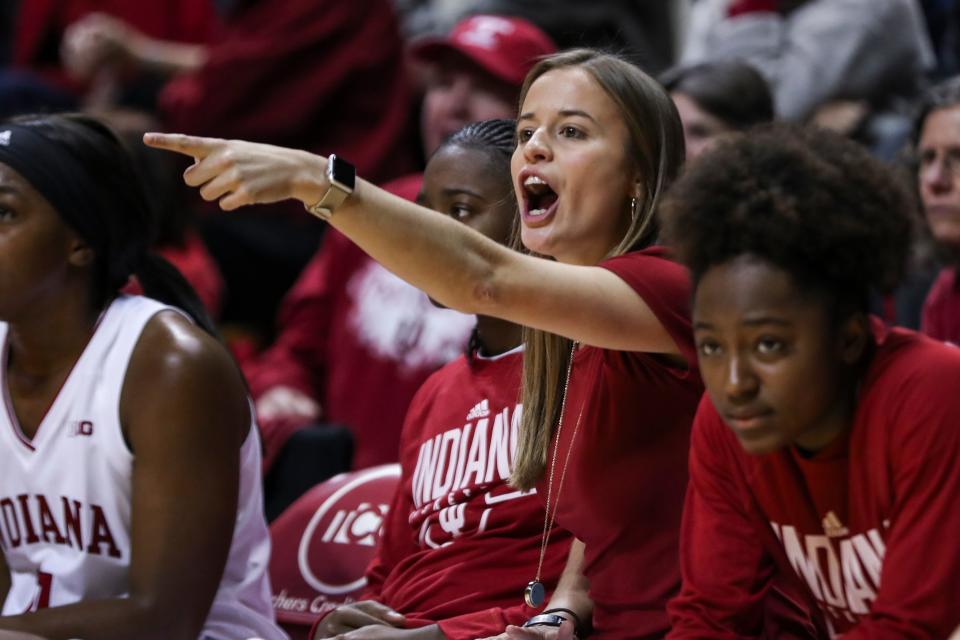 Then-graduate assistant Ashley Williams gives direction as Chanel Wilson looks on during a Nov. 7, 2018, game at Simon Skjodt Assembly Hall. Now in her first year as a full-time assistant coach with Indiana, Williams will face her alma mater, N.C. State, in the Sweet 16 tonight. (Amelia Herrick / Indiana Athletics)