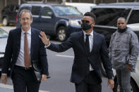 Cuba Gooding Jr., right, arrives at criminal court for his sexual misconduct case, Monday, Oct. 18, 2021, in New York. (AP Photo/John Minchillo)