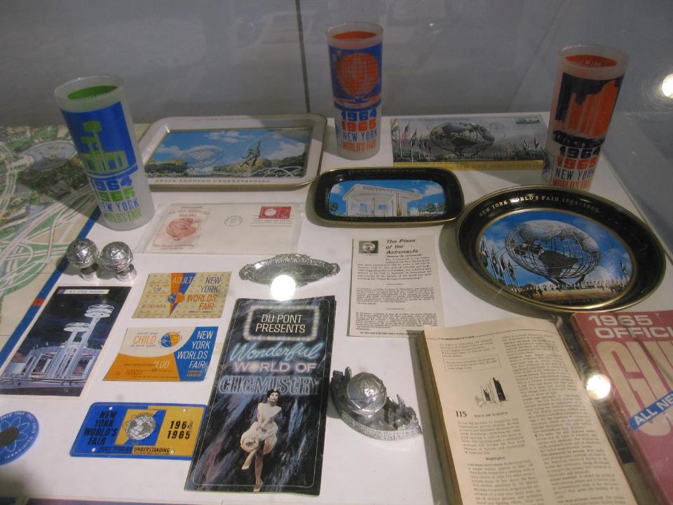 This April 9, 2014 photo shows a small display of artifacts from the 1964 World’s Fair on display inside the New York Hall of Science in Flushing Meadows Park in Corona, in the Queens borough of New York. The 50th anniversary of the fair is being observed April 22 and there are a number of sites and relics in Queens dating from the fair, including this display of tickets, brochures and other memorabilia. (AP Photo/Beth J. Harpaz)