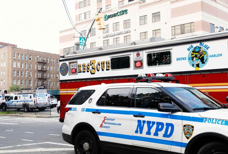 <p>Police and Fire Department vehicles line the streets after an incident in which a gunman fired shots inside the Bronx-Lebanon Hospital in New York City, June 30, 2017. (Brendan Mcdermid/Reuters) </p>