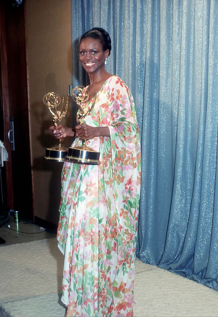Cicely Tyson holds the two Emmy Awards that she won for her performance in 