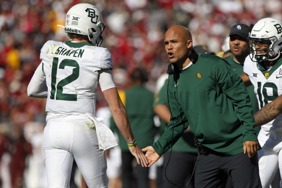 Baylor coach Dave Aranda, right, will call the defensive plays in the Armed Forces Bowl against Air Force. (AP Photo/Nate Billings)