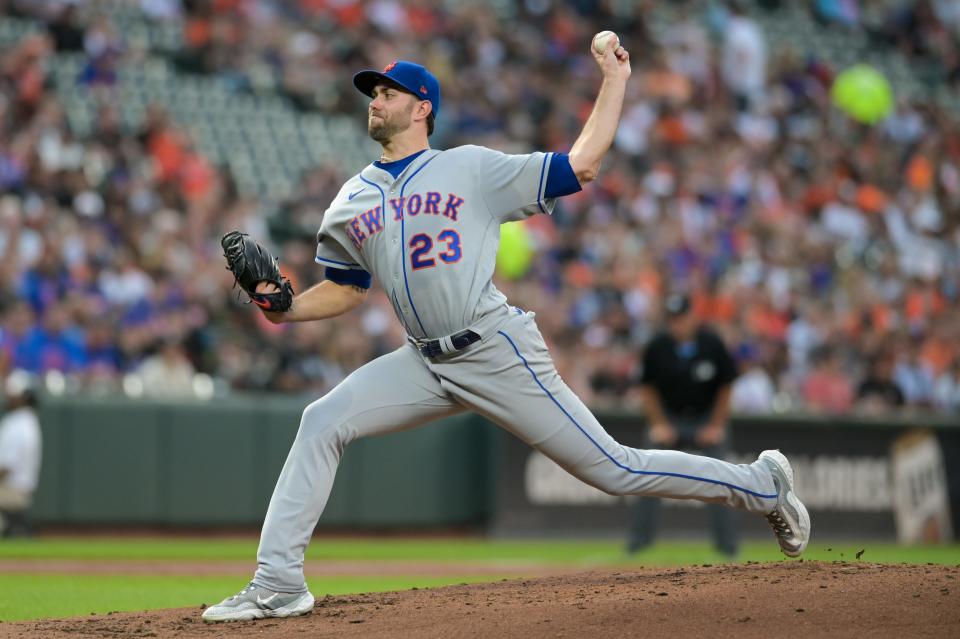New York Mets starting pitcher David Peterson (23) throws a second inning pitch against the Baltimore Orioles on Aug. 4, 2023, at Oriole Park at Camden Yards. Mandatory Credit: Tommy Gilligan-USA TODAY Sports