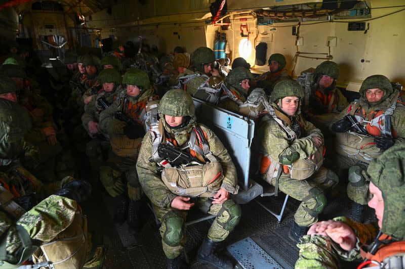 Russian paratroopers take part in drills at a military aerodrome in Taganrog