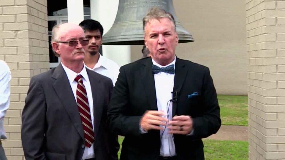 Carl Harrison, with his attorney David Harrison, filed notice that he plans to sue the City of Ozark for $6 million for damages including false imprisonment, and pain and suffering.  / Credit: CBS News