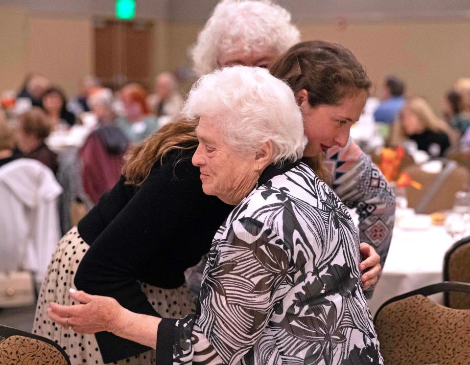 Sam Goldberg embraces Khaya Matusevich, a Holocaust survivor, at a dinner honoring Holocaust survivors hosted by The Nathan and Esther Pelz Holocaust Education Resource Center on Sept. 28, 2023 in Whitefish Bay, Wis.