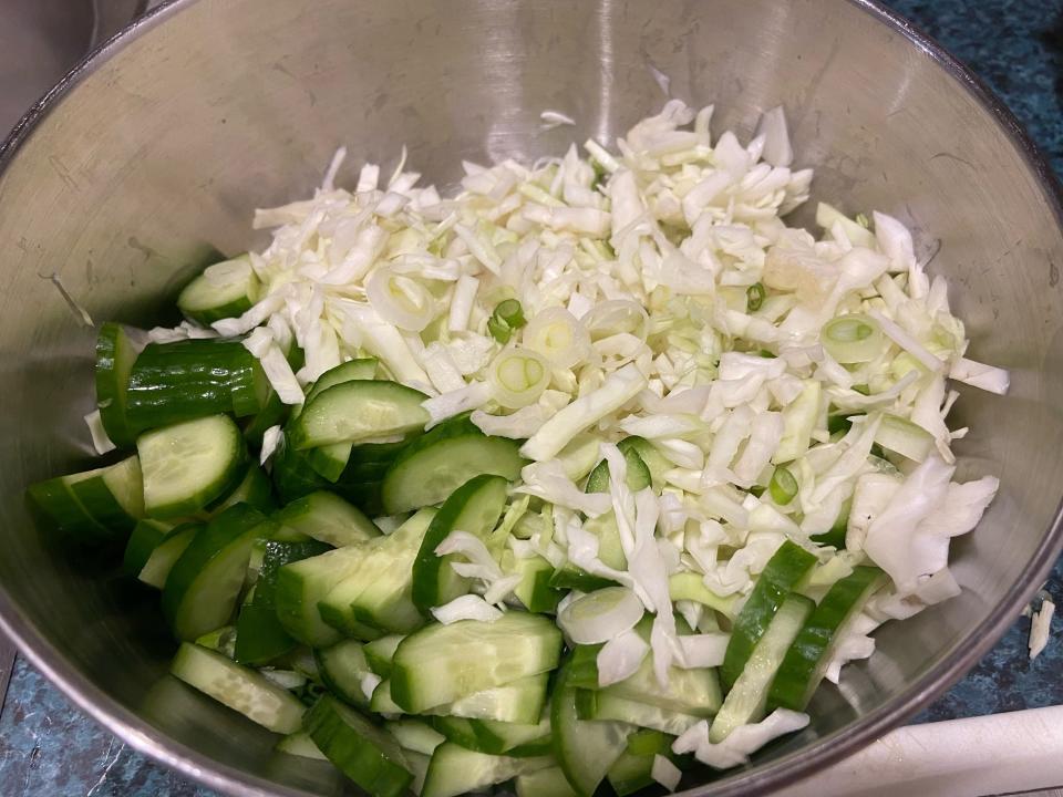 The dry ingredients in a large stainless steel bowl