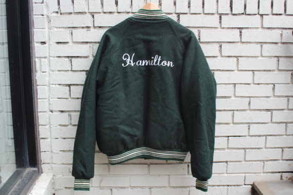 $54.99. <a href="https://www.etsy.com/listing/470244314/vintage-hamilton-varsity-jacket-button?ga_order=most_relevant&amp;ga_search_type=all&amp;ga_view_type=gallery&amp;ga_search_query=hamilton&amp;ref=sr_gallery_48" target="_blank">Buy it here</a>.