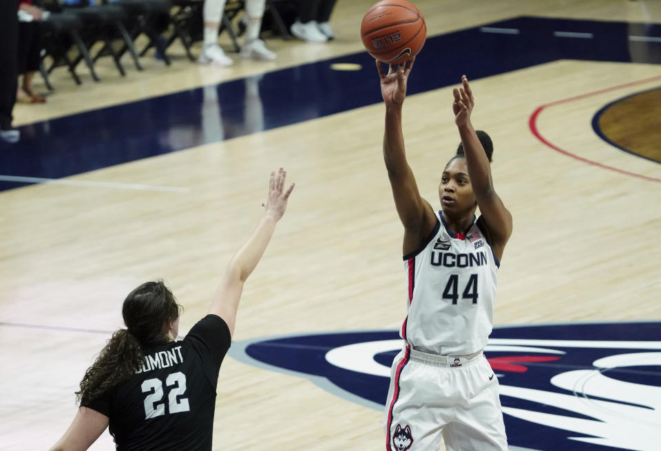 Connecticut forward Aubrey Griffin (44) shoots against Butler in the first half of an NCAA college basketball game Tuesday, Jan. 19, 2021, in Storrs, Conn. (David Butler II/Pool Photo via AP)