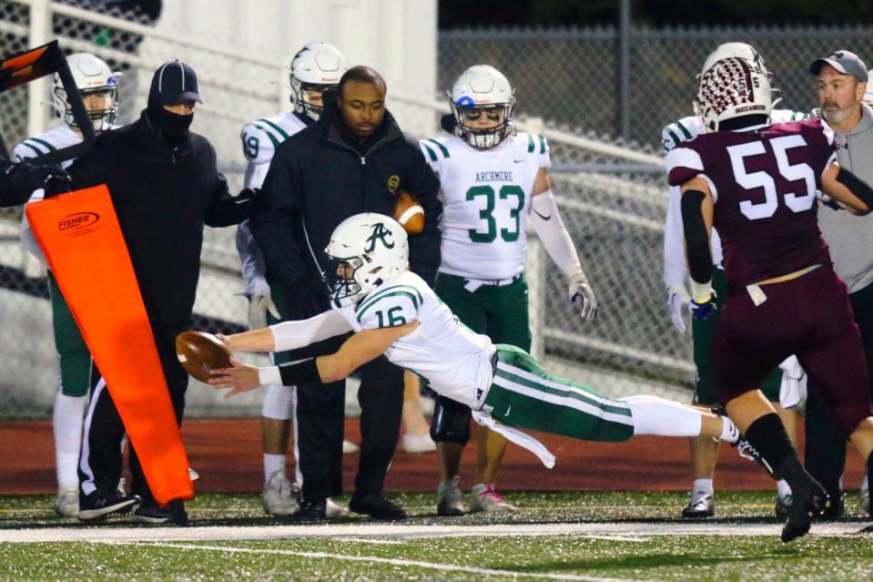 Archmere's Chris Albero dives for extra yards in the second quarter of Caravel's 30-6 win in the semifinals of the DIAA Class 2A state tournament Friday, Dec. 2, 2022 at Bob Peoples Stadium, 