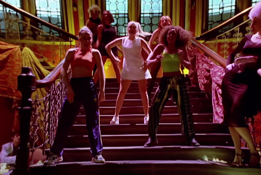 Screenshot of the Spice Girls dancing on a staircase