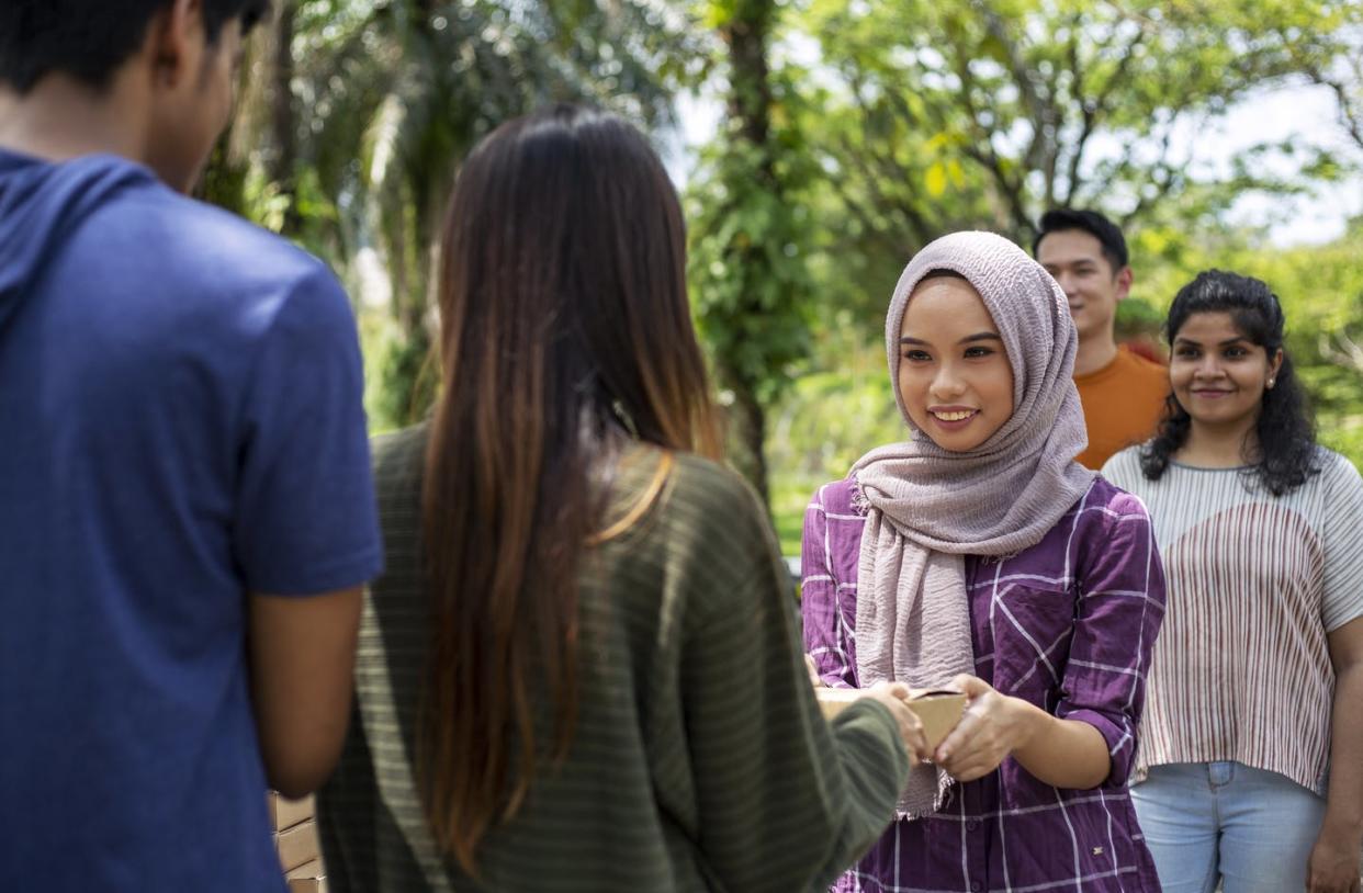 <span class="caption">Giving a portion of one's wealth annually is part of the spiritual practice in Islam.</span> <span class="attribution"><a class="link " href="https://www.gettyimages.com/detail/photo/poor-community-queueing-up-to-get-free-food-from-royalty-free-image/1317538574?adppopup=true" rel="nofollow noopener" target="_blank" data-ylk="slk:gahsoon/E+ via Getty Images;elm:context_link;itc:0;sec:content-canvas"> gahsoon/E+ via Getty Images</a></span>