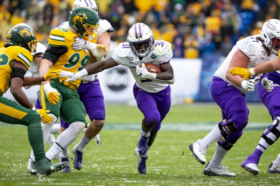 James Madison running back Percy Agyei-Obese (31) runs the ball during the first half of the FCS championship NCAA college football game against North Dakota State, Saturday, Jan. 11, 2020, in Frisco, Texas. (AP Photo/Sam Hodde)
