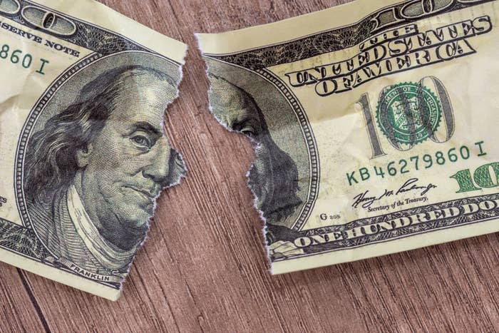 A torn $100 bill
