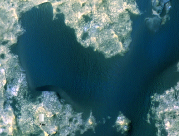 This image captured by NASA’s Mars Reconnaissance Orbiter shows the sand dune that will be the first to be visited by NASA's Curiosity Mars Rover along its route to higher layers of Mount Sharp